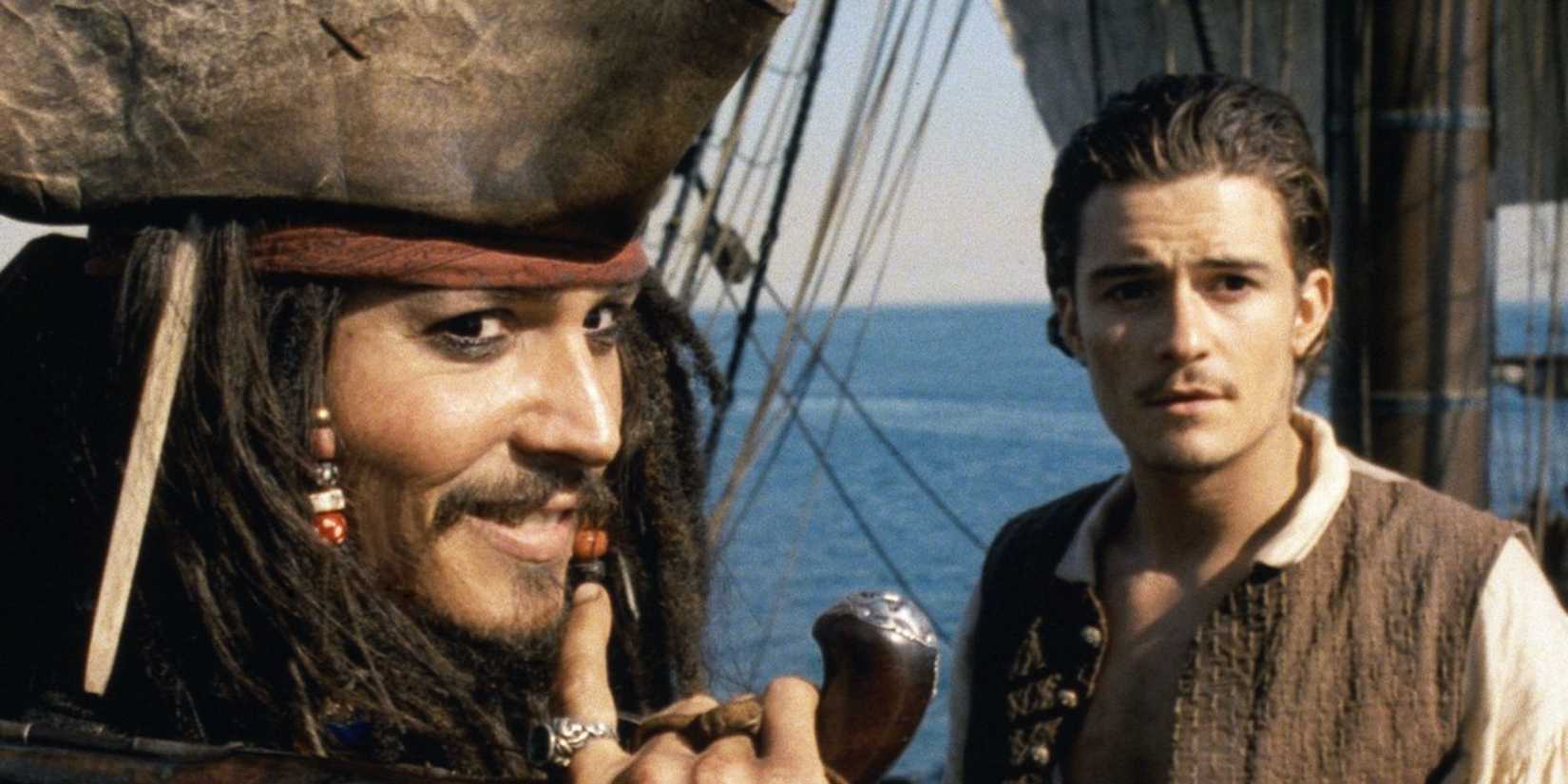 Jack Sparrow smiles and turns around while Will Turner looks confused in Curse of the Black Pearl 