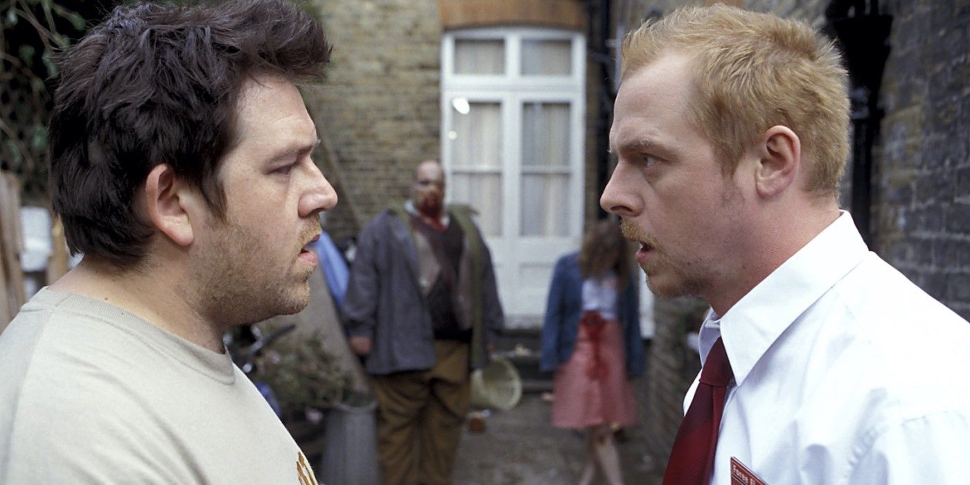 Zombies walking toward Simon Pegg and Nick Frost in 'Shaun of the Dead'
