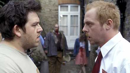 Zombies walking toward Simon Pegg and Nick Frost in 'Shaun of the Dead'