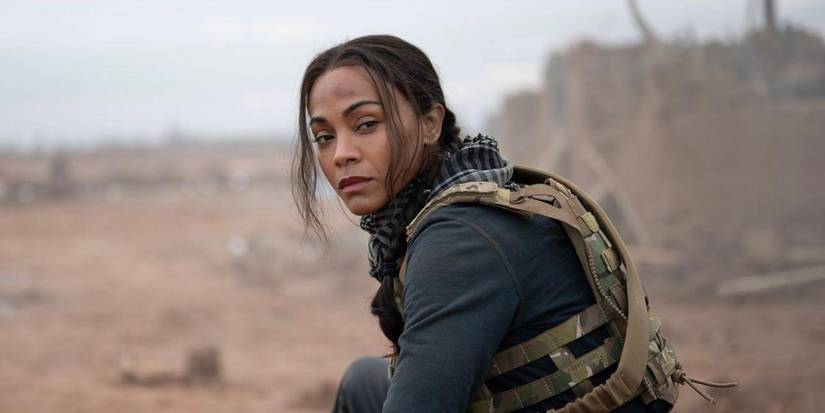 Zoe Saldana looks to the distance in the desert in Special Ops Lioness