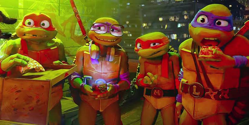 Group photo for Teenage Mutant Ninja Turtles: Mutant Mayhem of the turtles eating pizza and looking awkward.