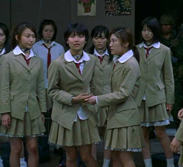 A group of students in junior high uniforms looking concerned in Battle Royale (2000)