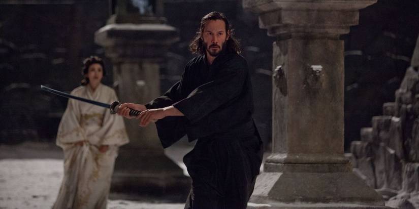 Keanu Reeves as Kai brandishing his samurai sword in 47 Ronin