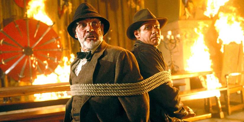 Sean Connery and Harrison Ford tied up in a burning building Indiana Jones and the Last Crusade