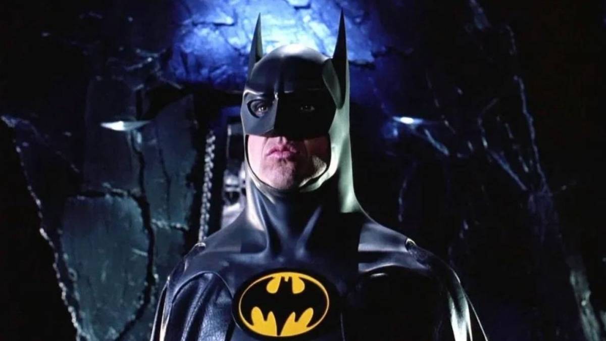 Michael Keaton as Batman standing in the batcave in Batman Returns