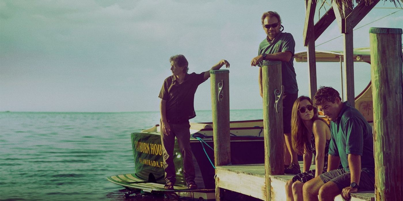The cast of Netflix's Bloodline sitting on a dock by the ocean