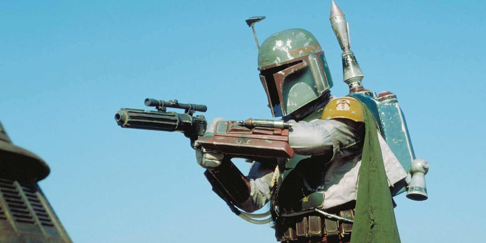 Boba Fett aims his weapon at something off screen in Return of the Jedi.