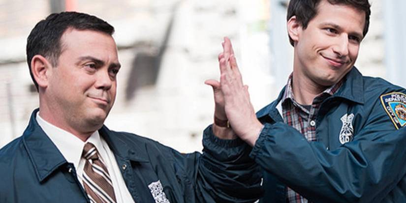 two NYPD officers high-fiving