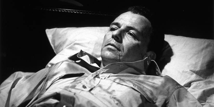 Frank Sinatra in bed awake in The Manchurian Candidate.