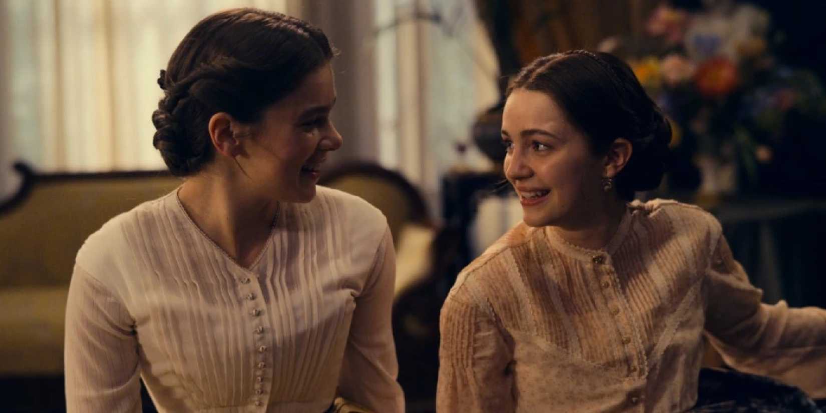 Hailee Steinfeld and Ella Hunt looking at each other in Dickinson