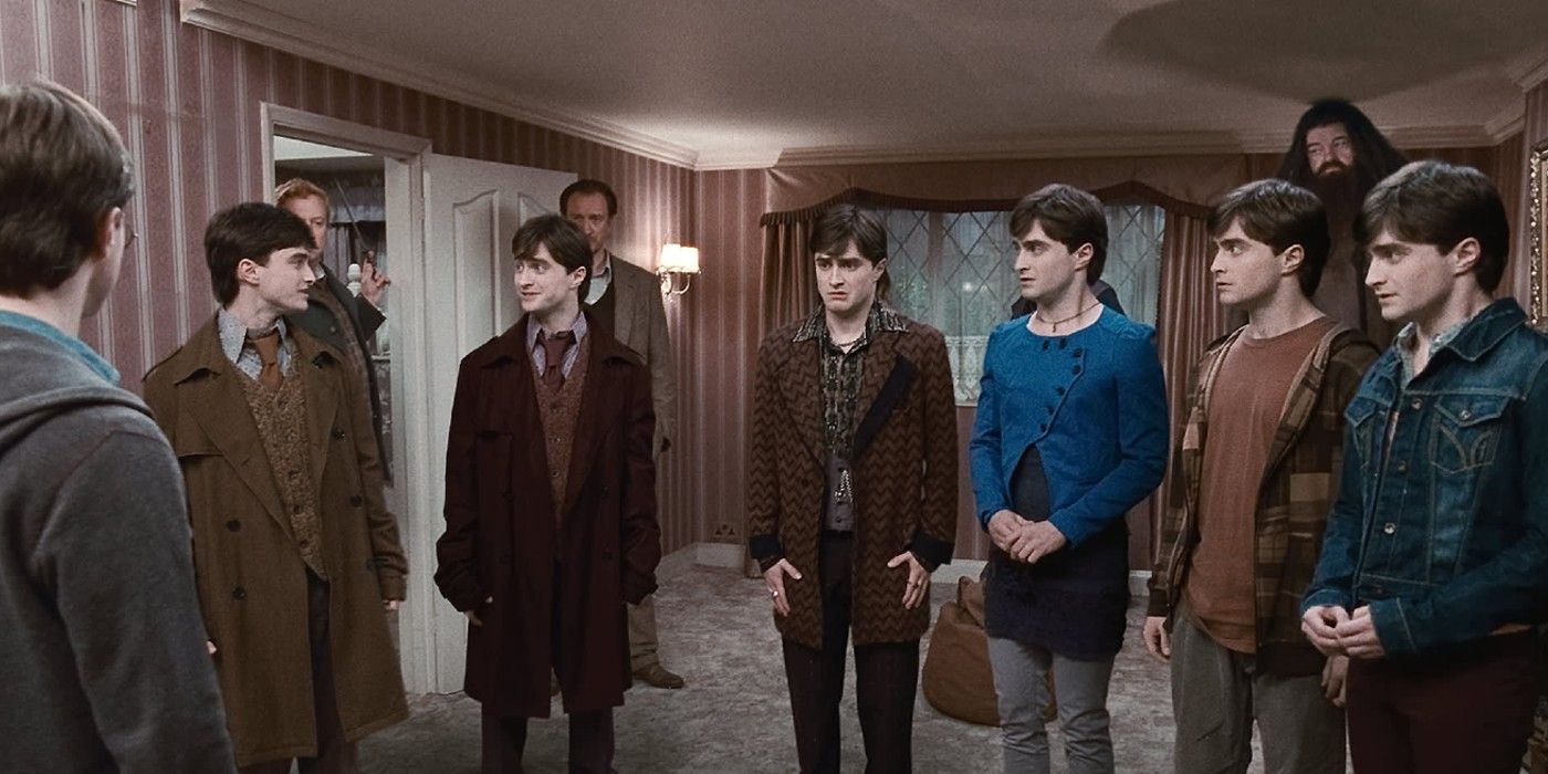 Harry Potter, played by Daniel Radcliffe, with the seven Potters in 'Harry Potter and the Deathly Hallows: Part 1.'