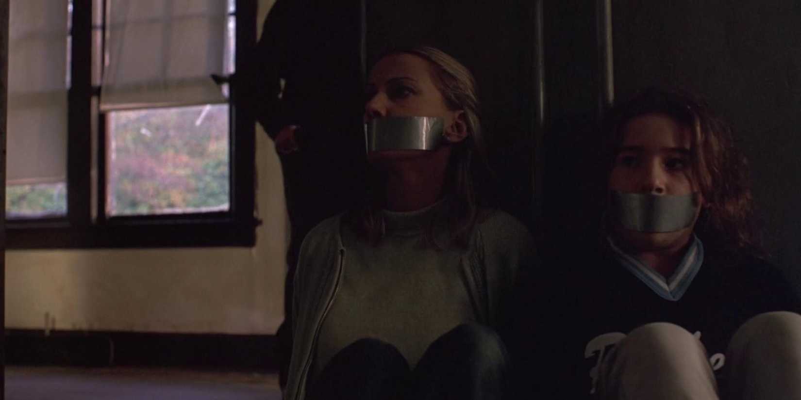 Two women bound and gagged in Malevolence