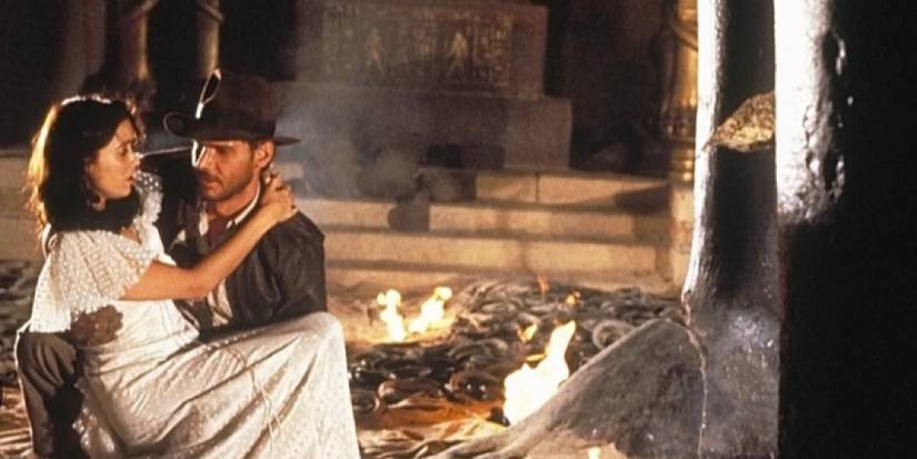 Indiana Jones picking up Marion in snake pit in Raiders of the Lost Ark. 