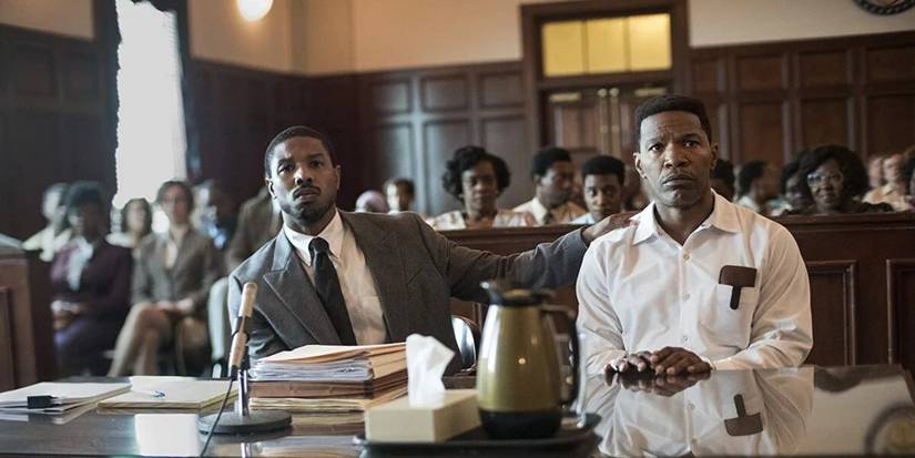 Michael B. Jordan is Jamie Foxx's lawyer, both sitting in court in Just Mercy