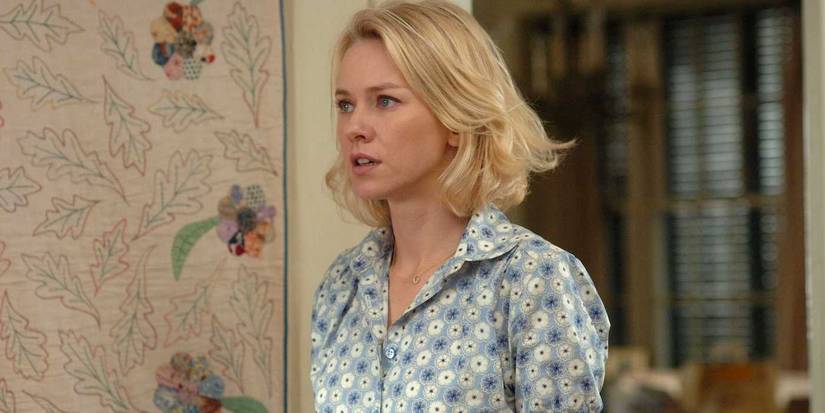 Naomi Watts standing in a house looking anxious in the 2007 'Funny Games'.