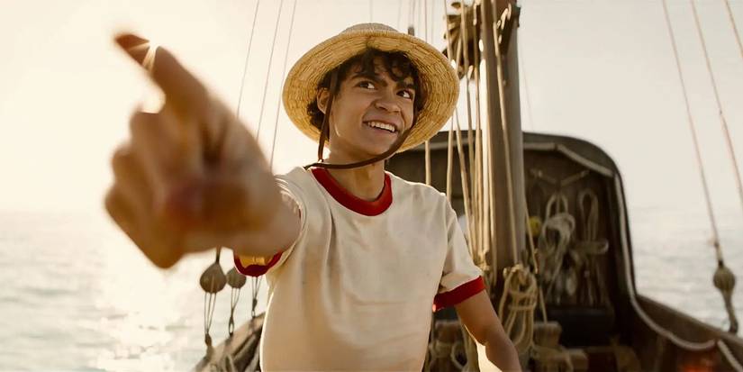 Iñaki Godoy as Monkey D. Luffy pointing ahead while on a boat in the live-action One Piece.