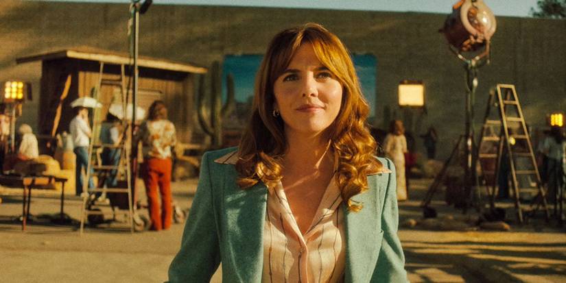 Ophelia Lovibond as Joyce walking on a film set in Minx Season 2.