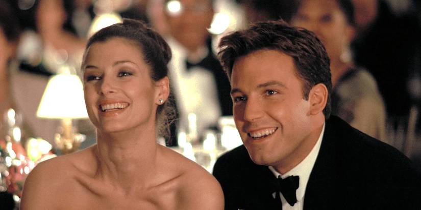 Cathy Mueller and Jack Ryan laughing at a party in The Sum of All Fears