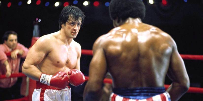 Rocky Balboa (Sylvester Stallone) in the ring fighting Apollo Creed (Carl Weathers) in Rocky (1976)