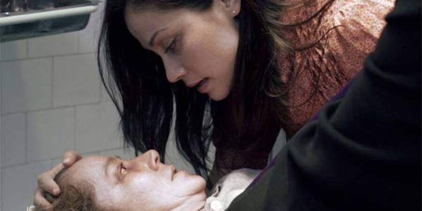 Two women looking at each other in The Devil Inside Movie 2012