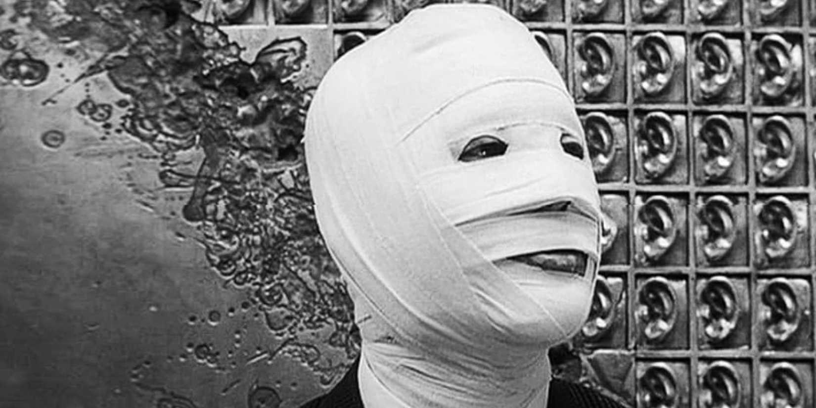 A masked man in The Face of Another.