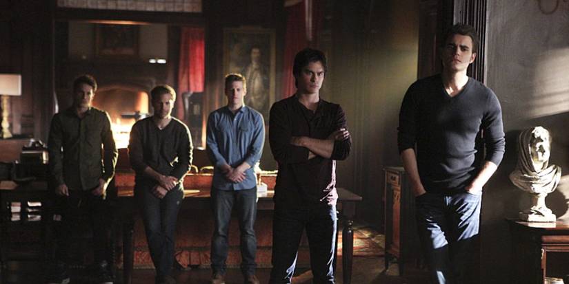 Tyler, Alaric, Matt, Damon, and Stefan standing together in 'The Vampire Diaries' Season 6.