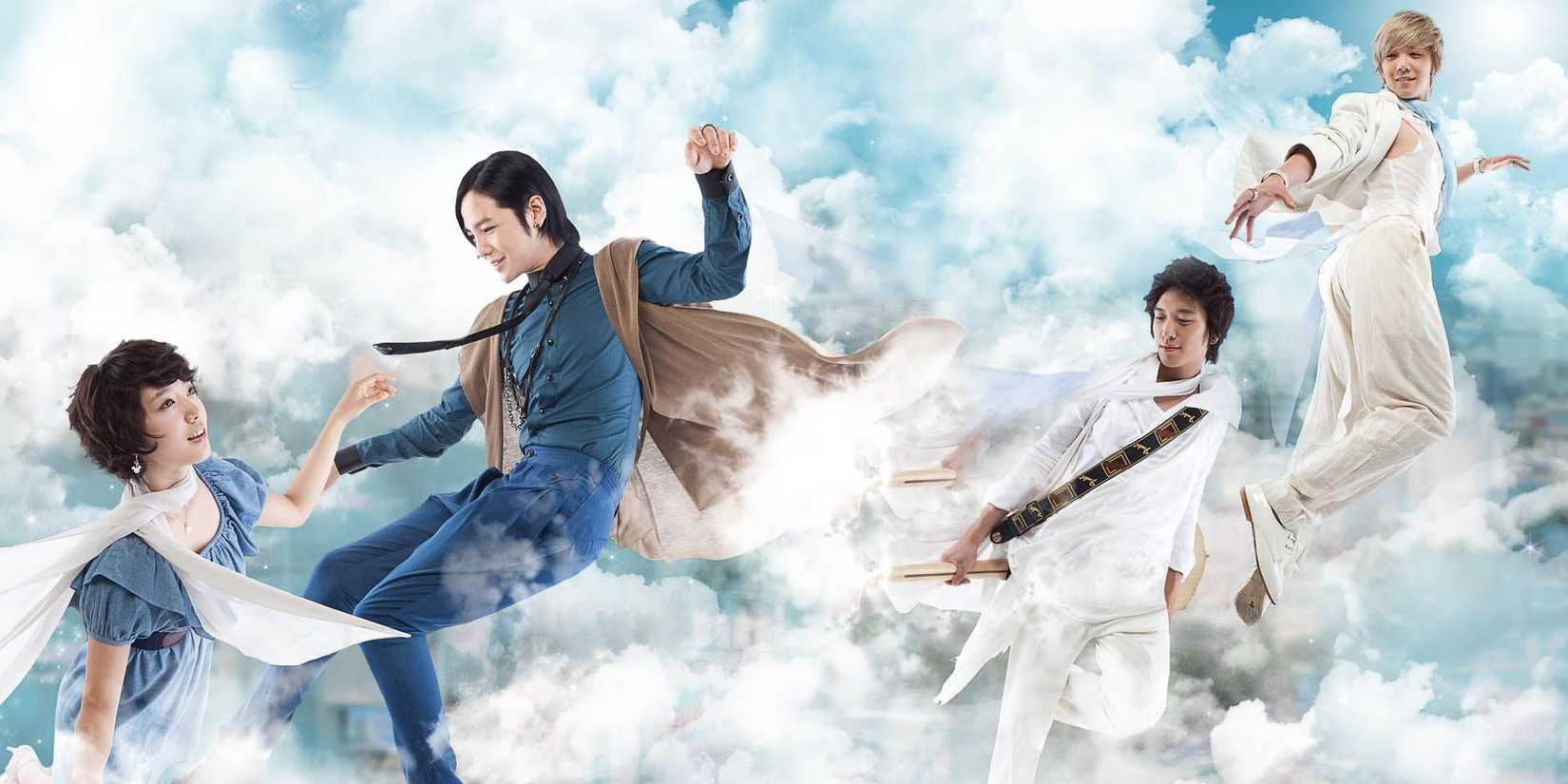 The cast float in clouds in a promo image for You're Beautiful. 