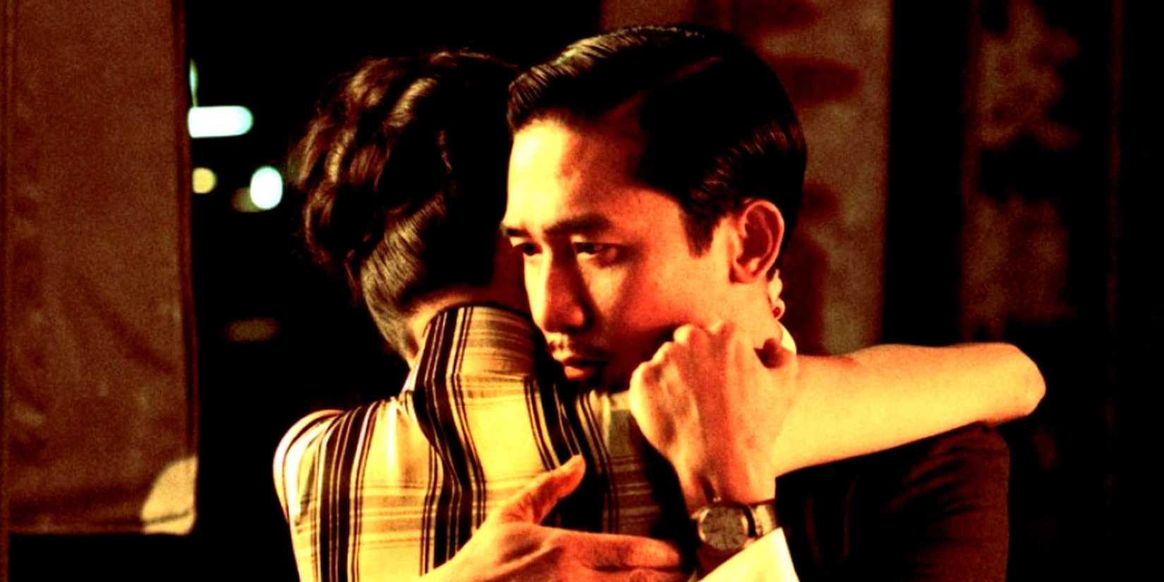 Tony Leung hugging a woman in '2046'