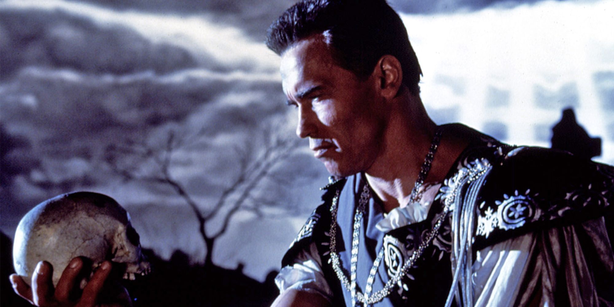 Arnold Schwarzenegger holding a skull in Last Action Hero