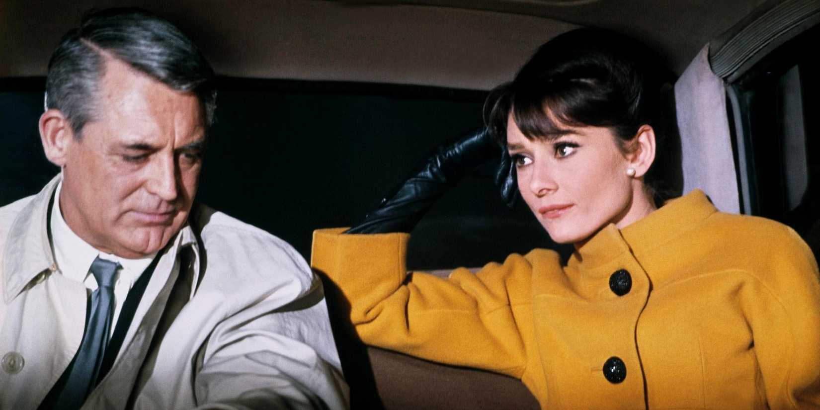 Brian and Regina in the back of car in the film Charade