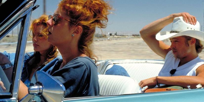 Brad Pitt, Geena Davis, and Susan Sarandon as J.D., Thelma, and Louise, driving in Thelma & Louise