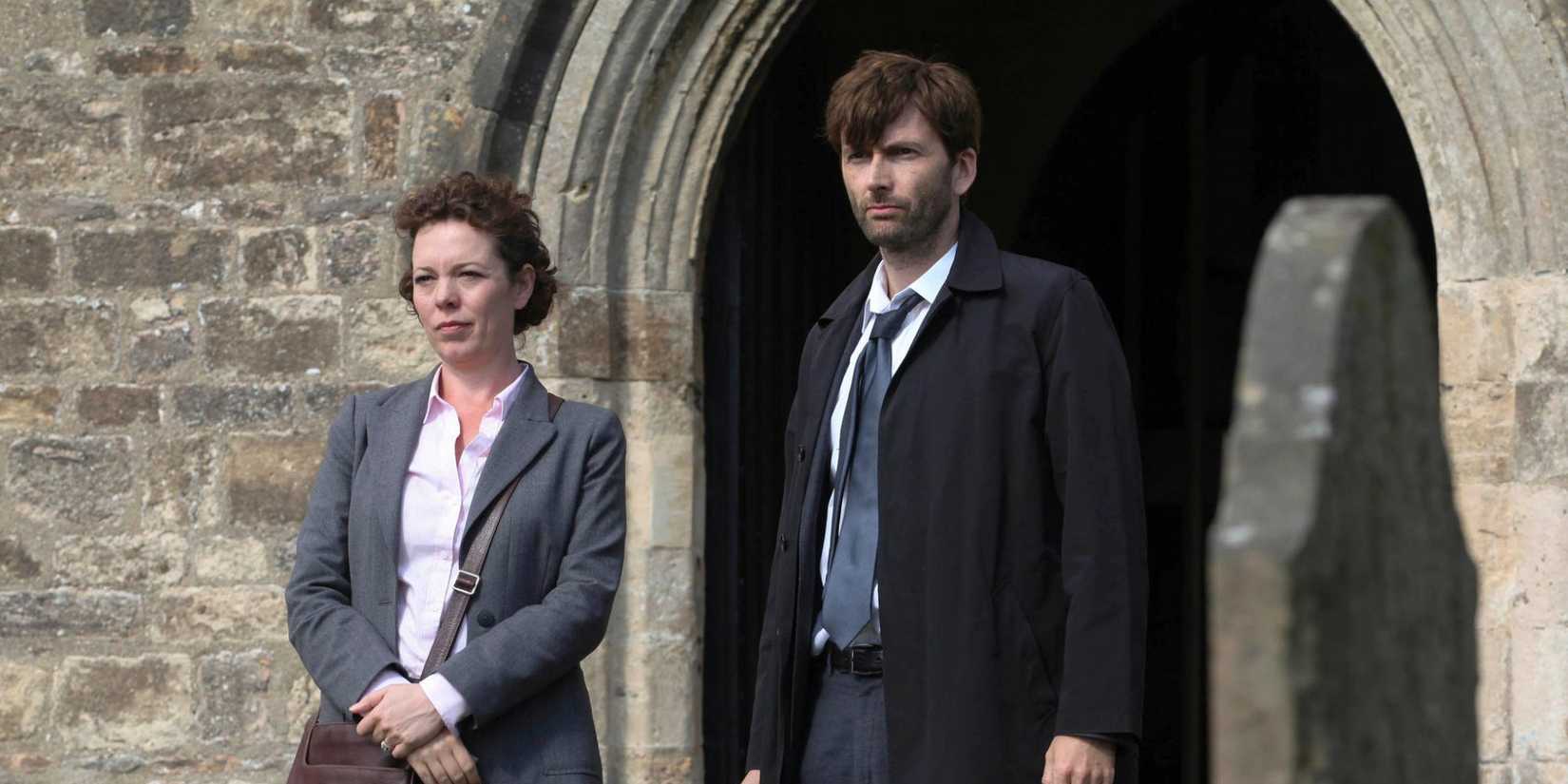 Olivia Colman as Ellie and David Tennant as Alec looking to the distance in Broadchurch.