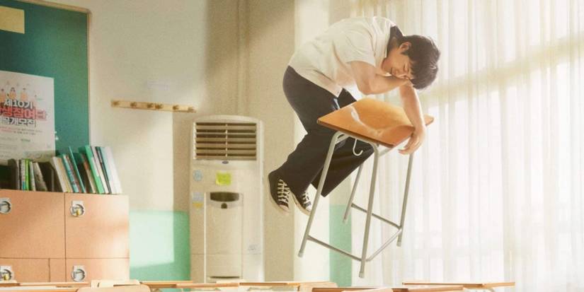 A person holds onto a small desk in midair on the poster for the K-Drama Moving. 