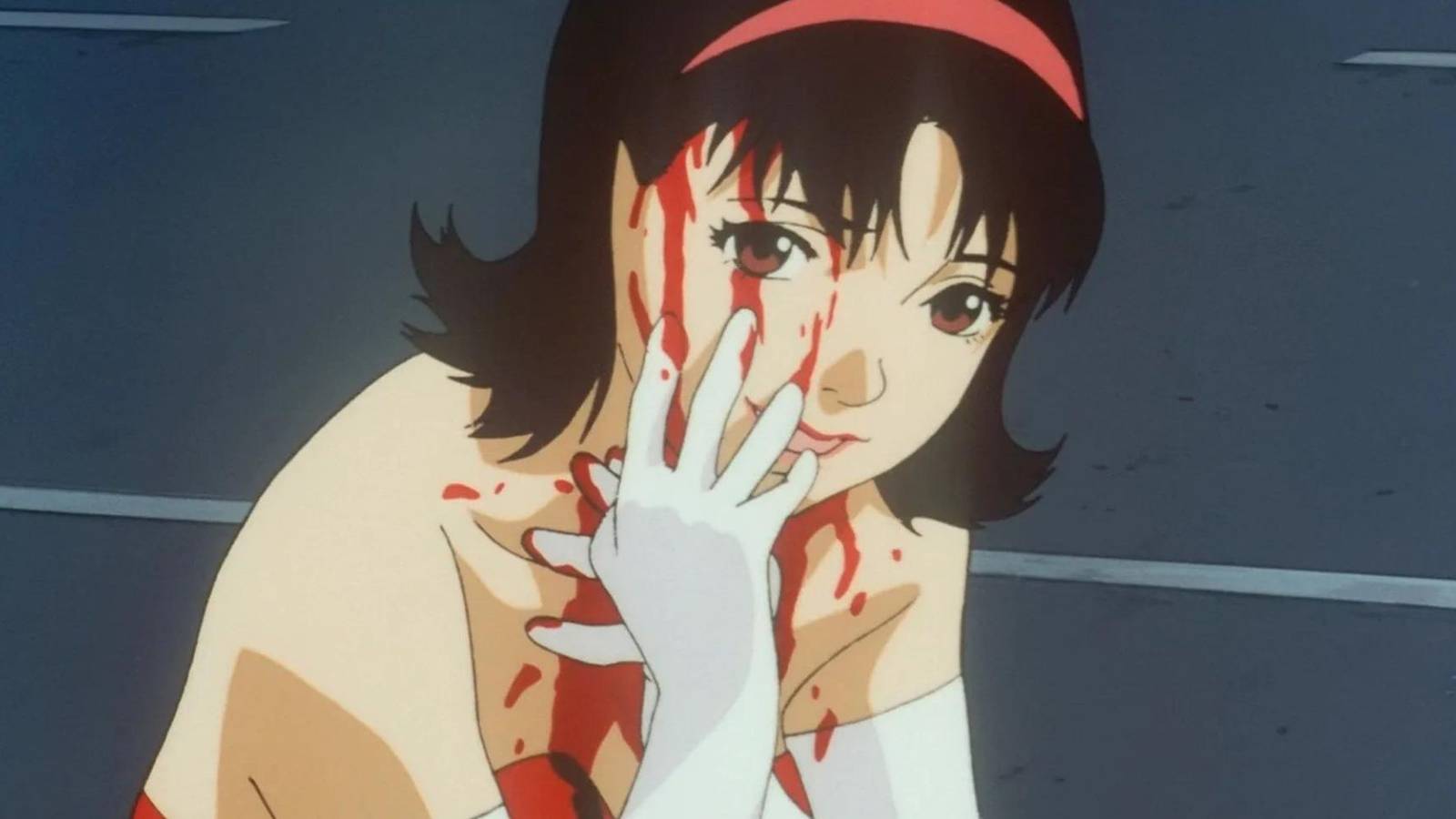 A distressed woman with blood on her face in Perfect Blue. 
