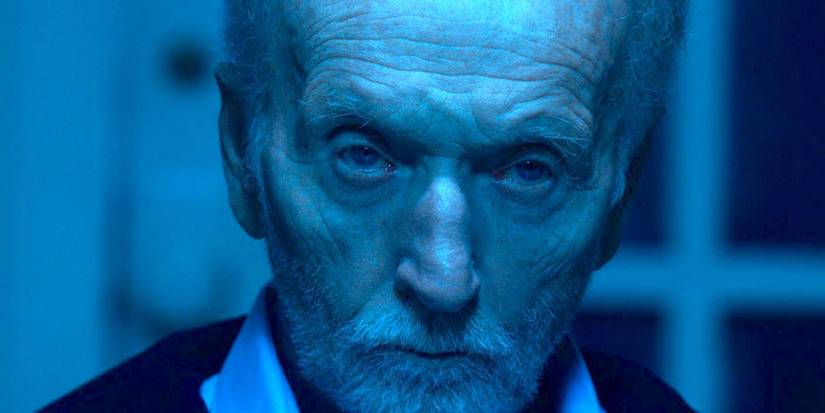 Tobin Bell as John Kramer/Jigsaw staring at the camera in Saw X