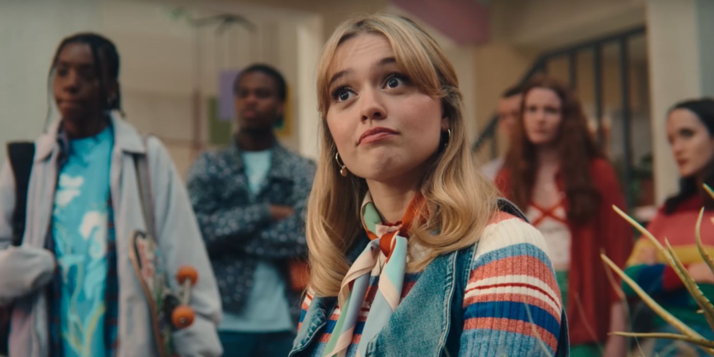 Aimee Lou Wood as Aimee in Sex Education Season 4 with her classmates behind her