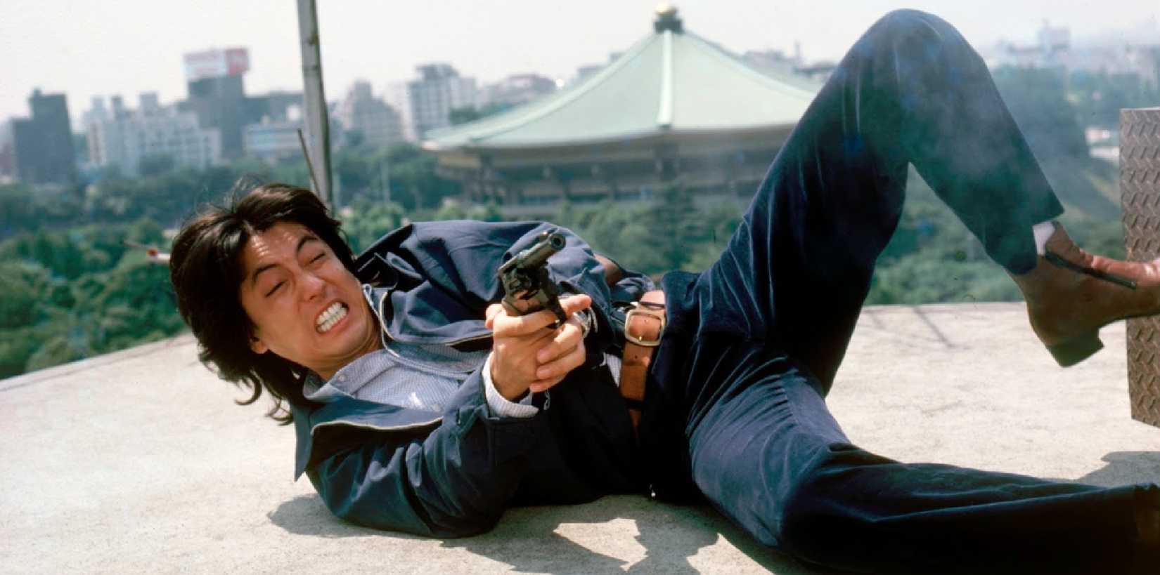 A man shooting a gun in The Man Who Stole the Sun