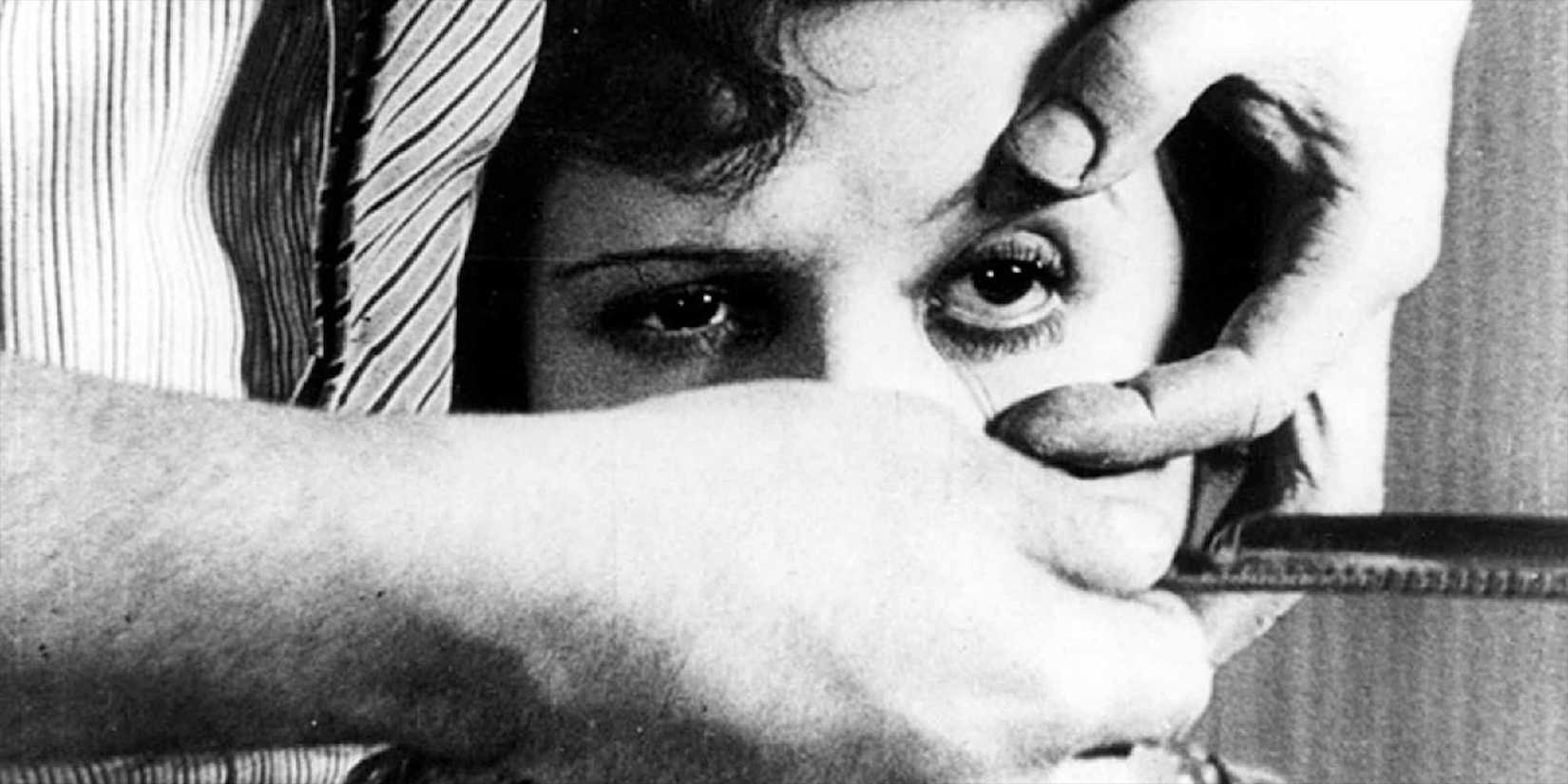 A hand opening a woman's eye in Un Chien Andalou