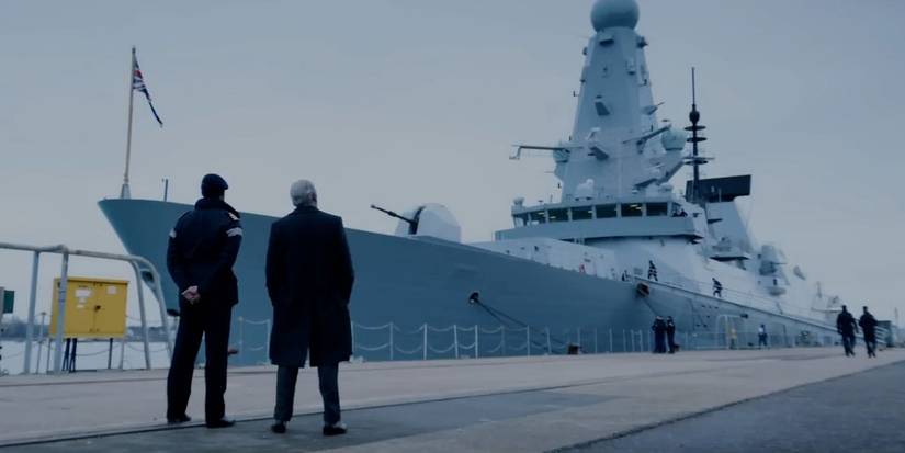 characters in Netflix's 3 Body Problem overlooking a giant warship