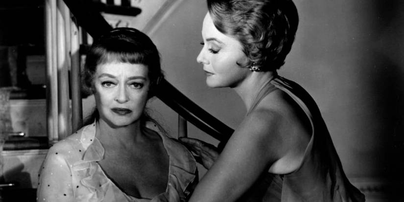 Miriam comforting a pensive-loooking Charlotte in Hush... Hush, Sweet Charlotte