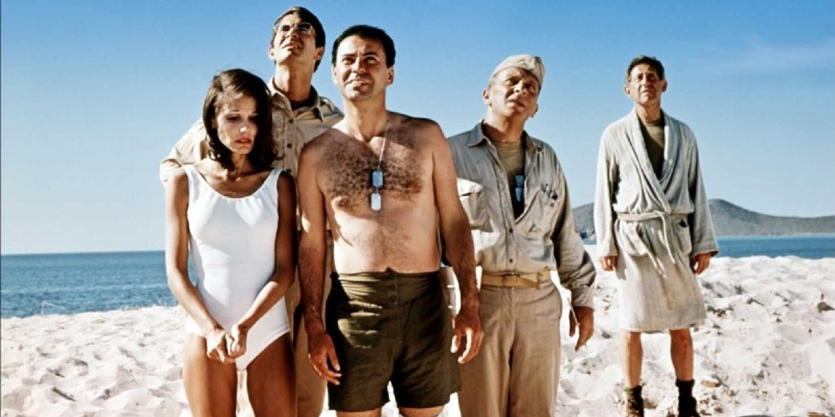 A group of soldiers at the beach in Catch-22 - 1970