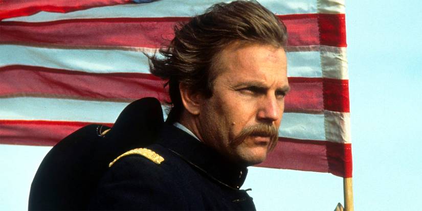 Kevin Costner holds an American flag in Dances With Wolves