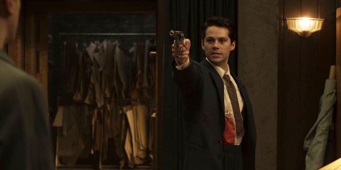 dylan-o-brien-in-the-outfit-cropped Netflix Is Officially Removing the Action-Thriller That Asks “What If Guy Ritchie Directed John Wick?”