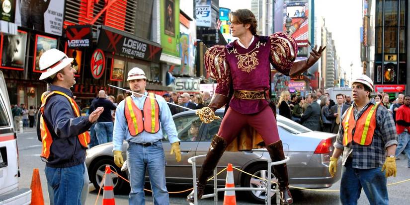 Prince Edward (James Marsden) brandishing his sword at a group of construction workers in New York City in Enchanted