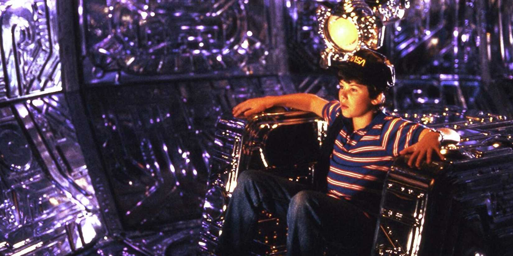 A boy sitting on a chair in Flight of the Navigator