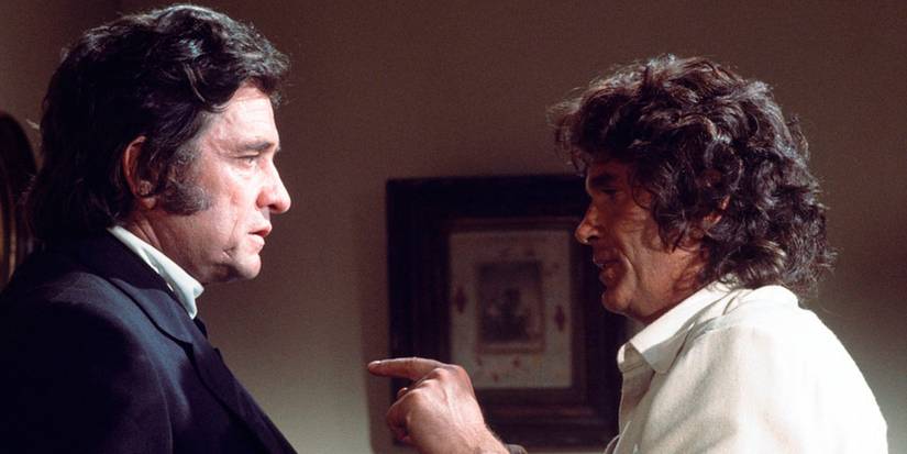 Johnny Cash as Caleb Hodgekiss and Michael Landon as Charles Ingalls in "The Collection" episode of 'Little House on the Prairie.'