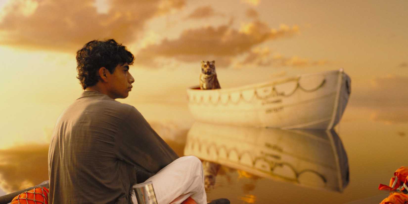 Pi on a boat with Richard Parker in Life of Pi’ (2012)
