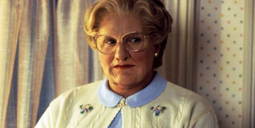 A close-up of Robin Williams as Mrs. Doubtfire looking upset in 'Mrs. Doubtfire'