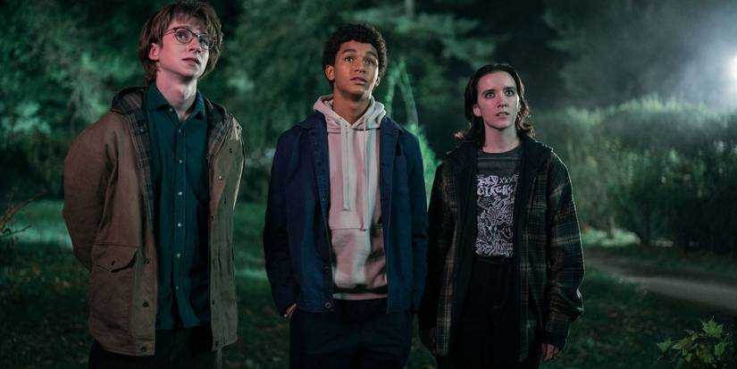 Spoon, Mickey, and Ema standing in the dark in Harlan Coben's Shelter.