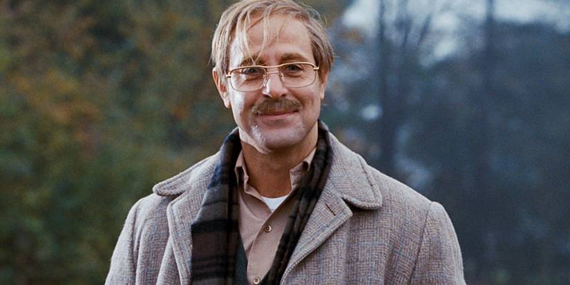 Close up of Stanley Tucci as George Harvey smiling in The Lovely Bones